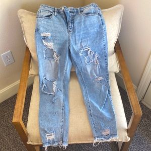 Distressed denim jeans